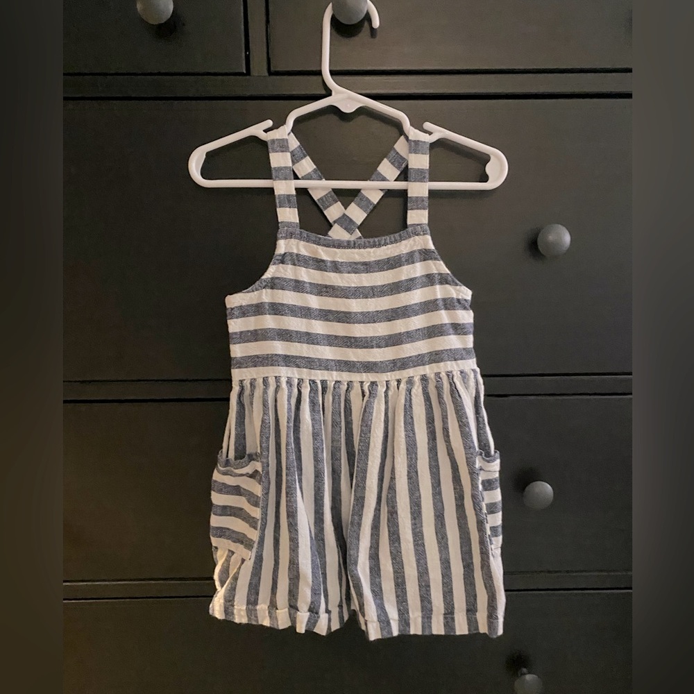 Girls dress, lightweight linen blend with pockets and adjustable button straps.